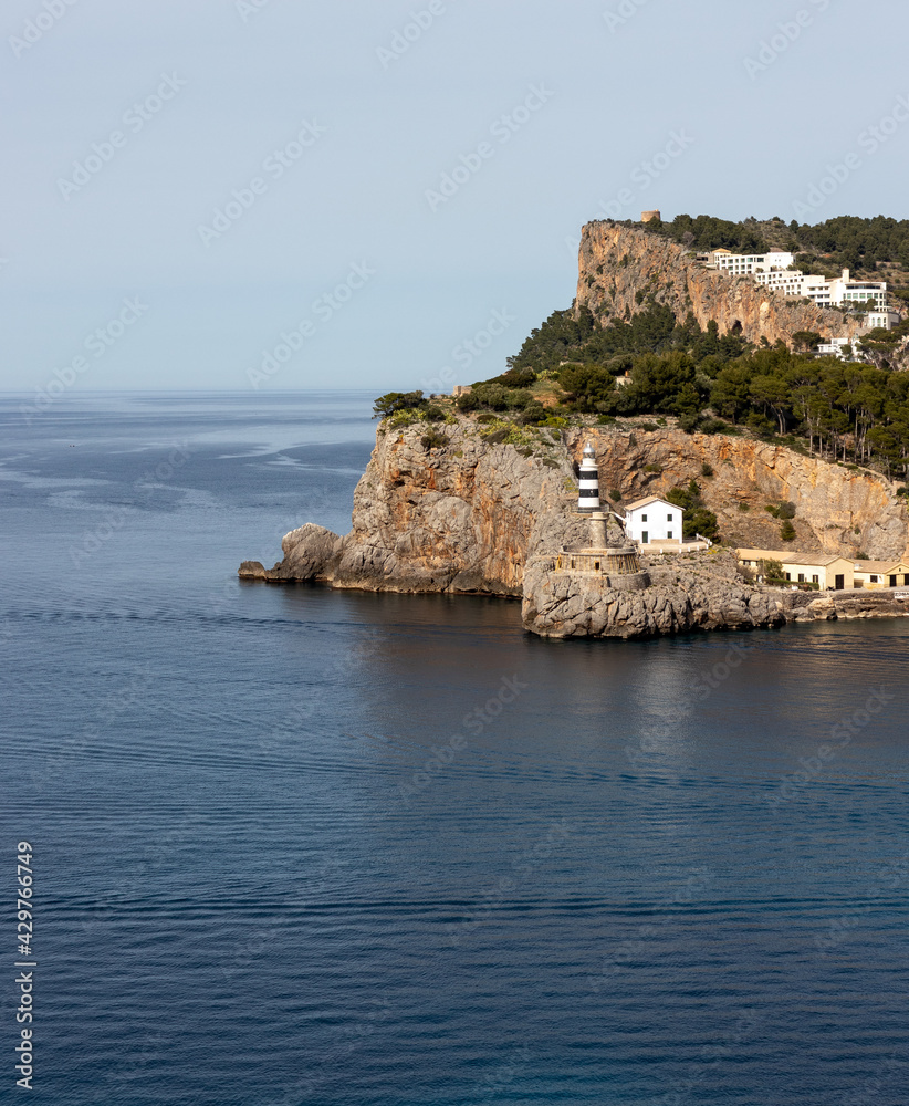 View of the lighthouse at entrance into Soller Bay, Port de Soller, Mallorca, Spain