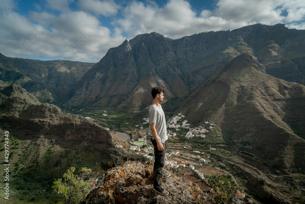 young man contemplates the landscape. Agaete valley. gran canaria