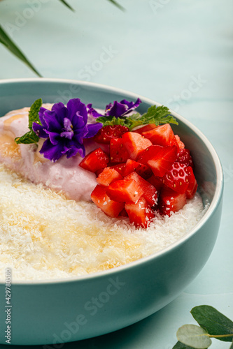 Bowl of gourmet hawaiian style rice porridge with coconut milk photo