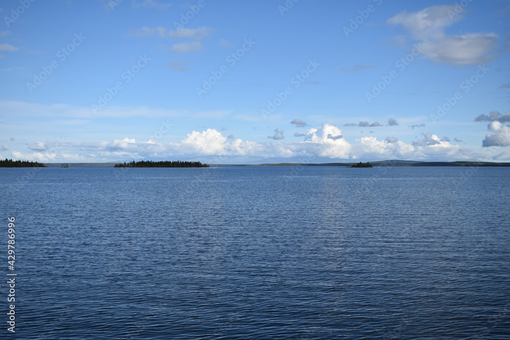 A huge lake in the north of Russia in early spring on a sunny day.