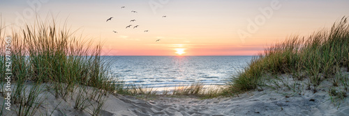 Dune beach panorama at sunset