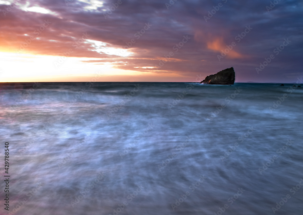 dramatic sunset on Broadhaven Beach in Pembrokeshire , Wales.