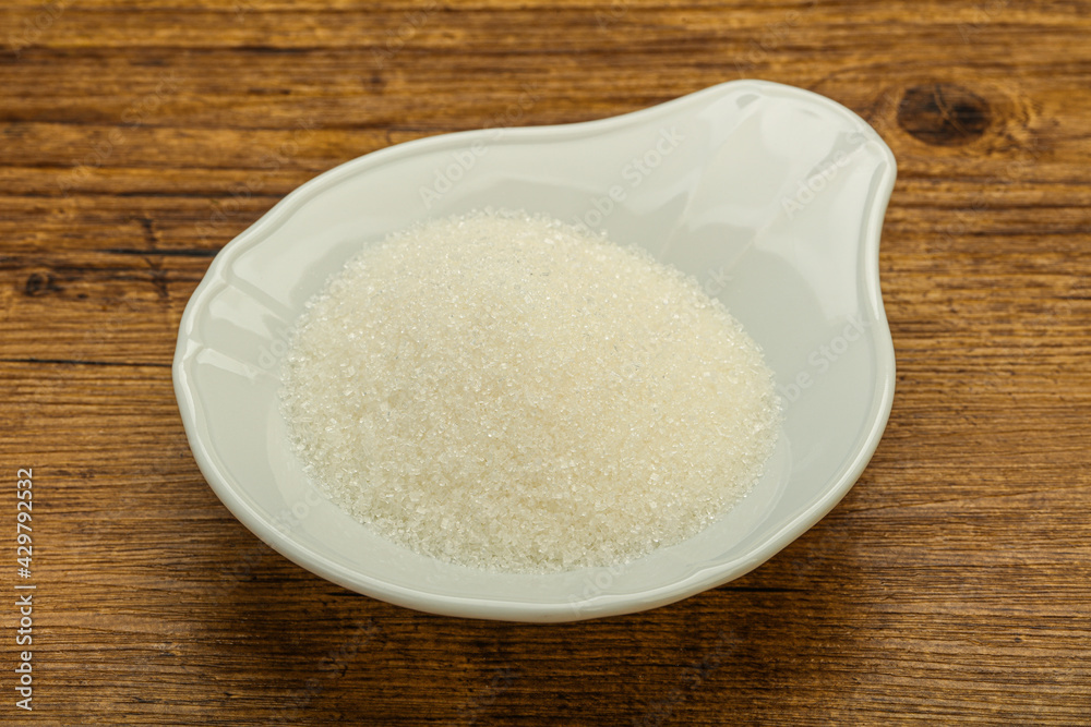 White sugar in the bowl White sugar in the bowl