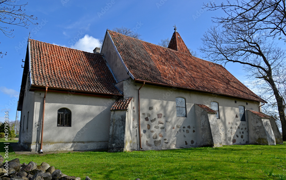 Currently erected in the 16th century, the Catholic Church of Saint Józef Rzemielnik in Nakomiady in Masuria, Poland. The photos show a general view of the temple.