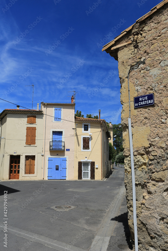 Colourful buildings in a quiet street in rural France