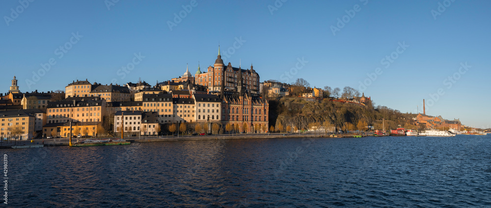 View over old houses in the Södermalm district a spring day at sunrise in Stockholm from the Riddarholmen island