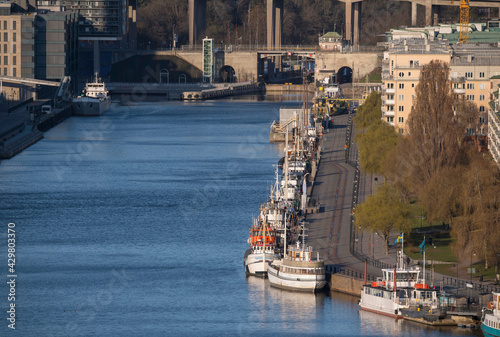 Morning spring harbor view over the district Hammarby in Stockholm photo