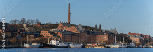 View over old houses in the Södermalm district a spring day at sunrise in Stockholm from the Riddarholmen island.