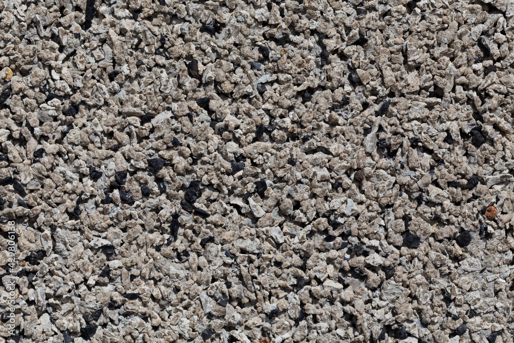Crushed granite stones wall - close up Crushed granite stones wall - close up