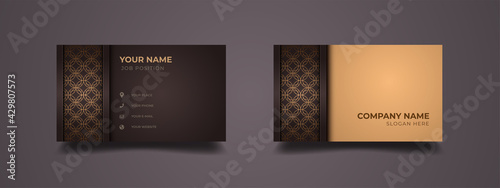 Elegant ethnic business card design with gold lines pattern. Abstract luxury background with golden and brown in two-sided. Vector illustration ready to print.