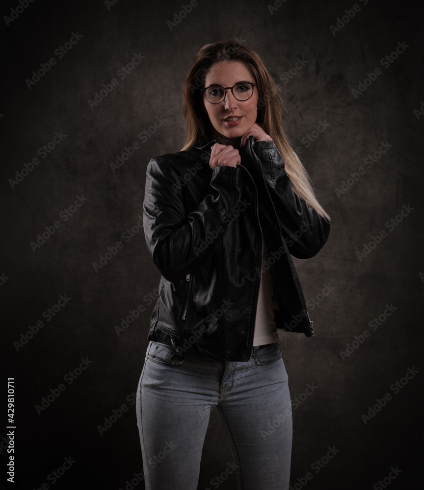 Young attractive woman has a photo shoot in a studio - studio photography Young attractive woman has a photo shoot in a studio - studio photography