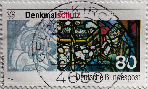 GERMANY - CIRCA 1986    a postage stamp from Germany  showing restored glass painting in Regensburg Cathedral. Monument protection