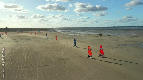 Racing on Blokarts by the ocean. France. High quality 2K footage photo