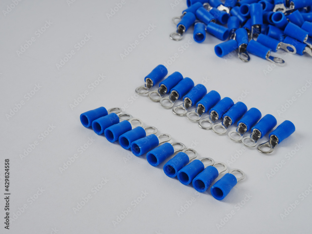electrical crimp terminal isolated on white background. metal connector. tips for cables and wires. reliable electrical contact. accessories and spare parts. electrical crimp terminal isolated on white background. metal connector. tips for cables and wires. reliable electrical contact. accessories and spare parts.