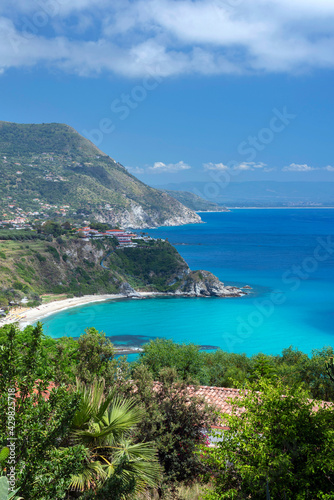 Ricadi, Vibo Valentia district, Calabria, Italy, Europe, Grotticelle beach in the background the south coast of Capo Vaticano and Mount Poro