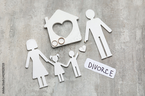 Figures of family, house an...