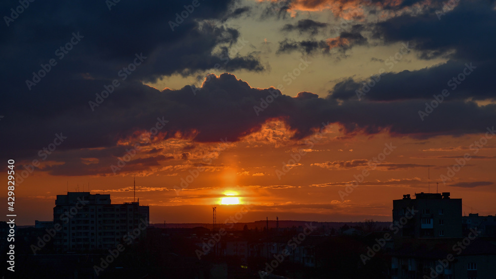Golden sunset with fantastic orange colours over the city skyline. Golden sunset with fantastic orange colours over the city skyline.