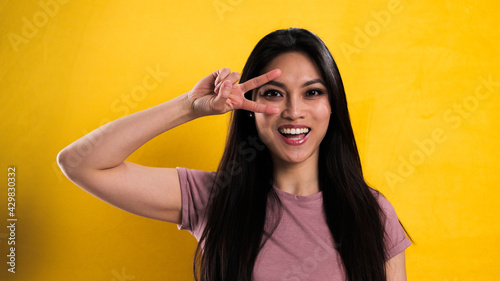 Young woman full of energy fooling around - studio photography photo