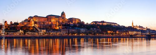 Hungary, Budapest at night, Buda Fortress illuminated by lights, reflected in the water, panorama