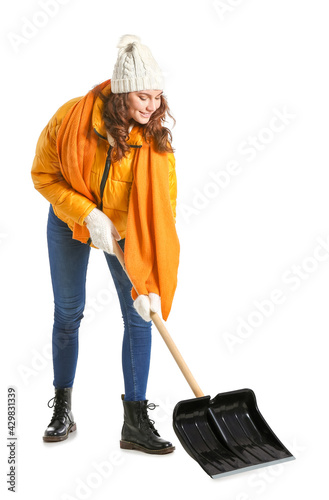 Young woman with shovel for...