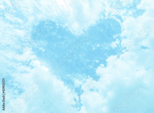 Photography Blue pastel colour of heart shape white cloud and sky background
