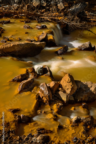 Ridgway  CO  US close up of the Red Mountain Creek with its characteristic color