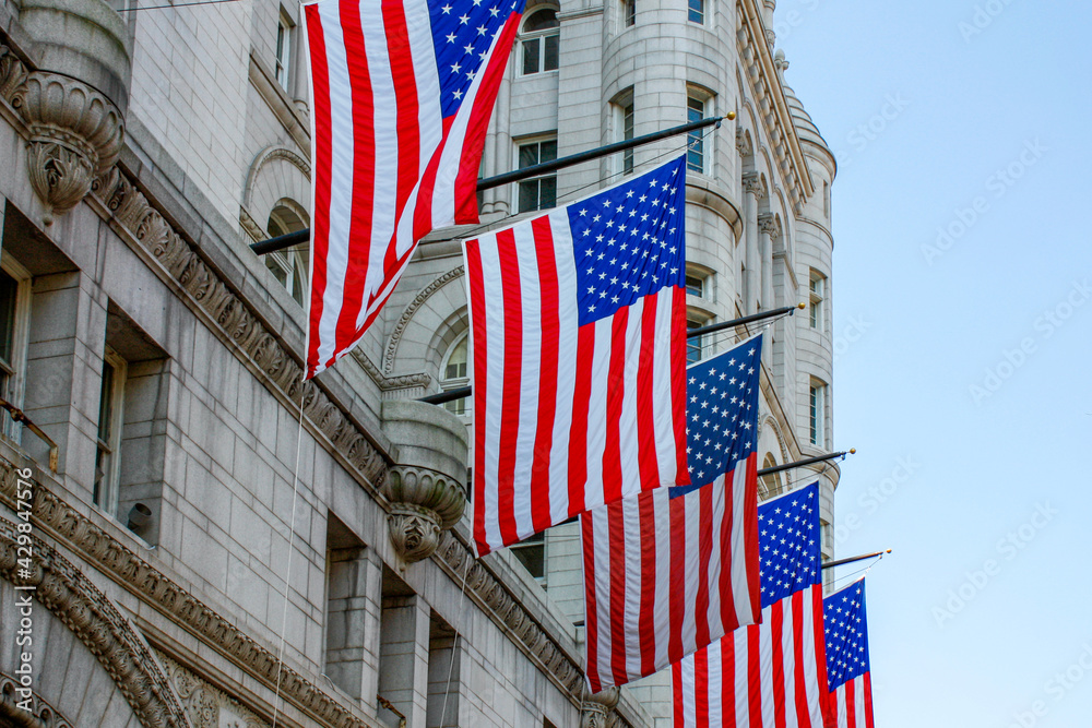 Flags of the United States of America on the outside of a building in Washington D.C. 