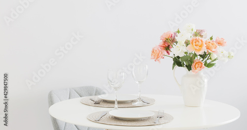 served table with  bouquet of roses