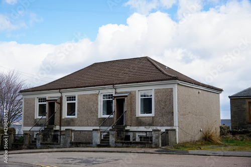 Derelict council house in poor housing estate slum with many social welfare issues in Port Glasgow © Richard Johnson