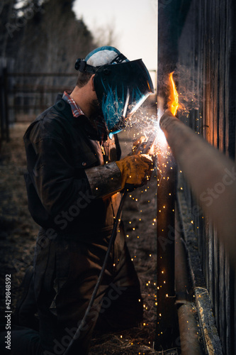Welder Welding and Iron Fence