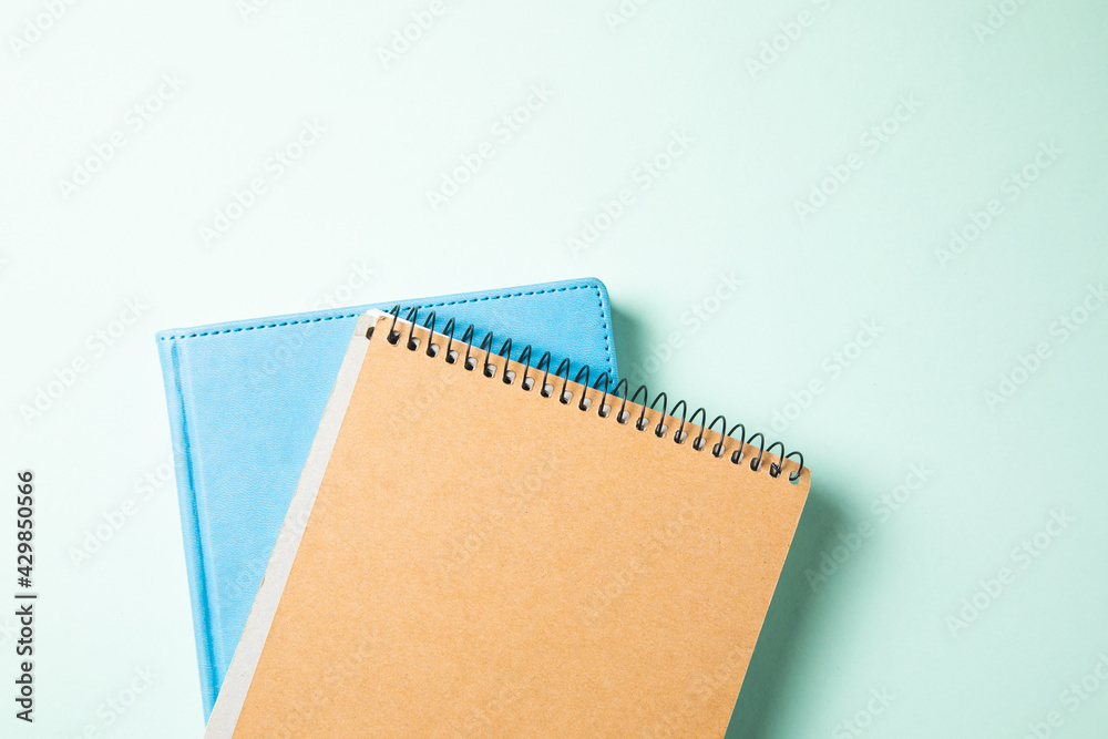 notebook with book on the table notebook with book on the table