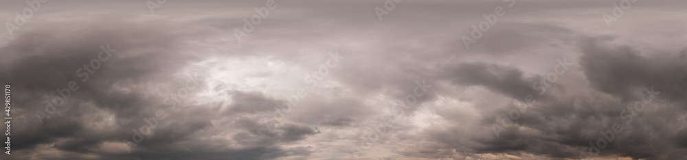 Overcast sky panorama on sunset with Cumulus clouds in Seamless spherical equirectangular format as full zenith for use in 3D graphics, game and aerial drone 360 degree panoramas for sky replacement. Overcast sky panorama on sunset with Cumulus clouds in Seamless spherical equirectangular format as full zenith for use in 3D graphics, game and aerial drone 360 degree panoramas for sky replacement.