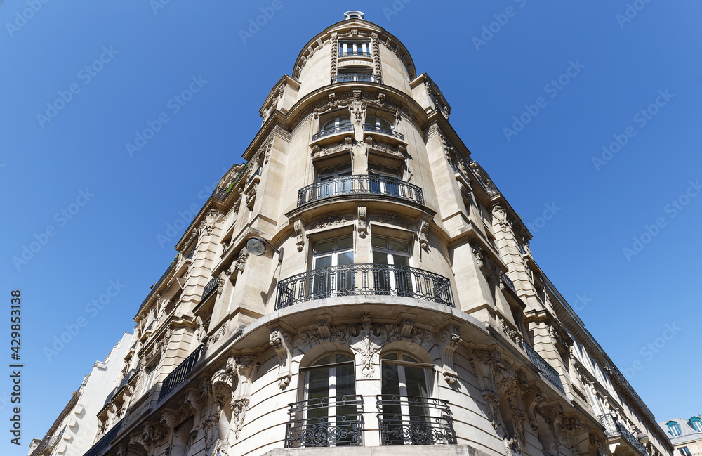 Traditional French house with typical balconies and windows. Paris. Traditional French house with typical balconies and windows. Paris.