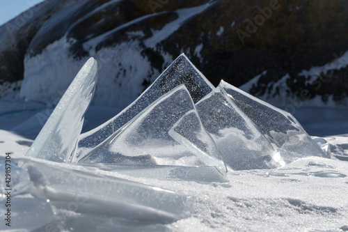 Fotografie Scenic winter lake Baikal landscape with huge pressure ridge transparent ice blo