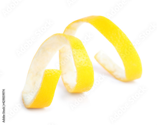 Fresh peel of lemon on white background