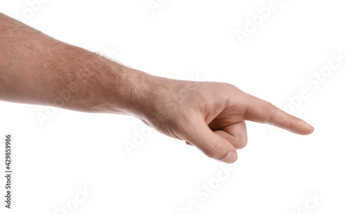 Man pointing with index finger on white background, closeup