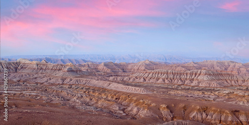 Panorama of Earth Forest National Geopark and Himalayas at sunset in Ngari prefecture, Western Tibet, China