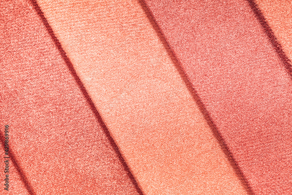 Fototapeta premium Blusher or bronzer shimmering palette texture pressed background