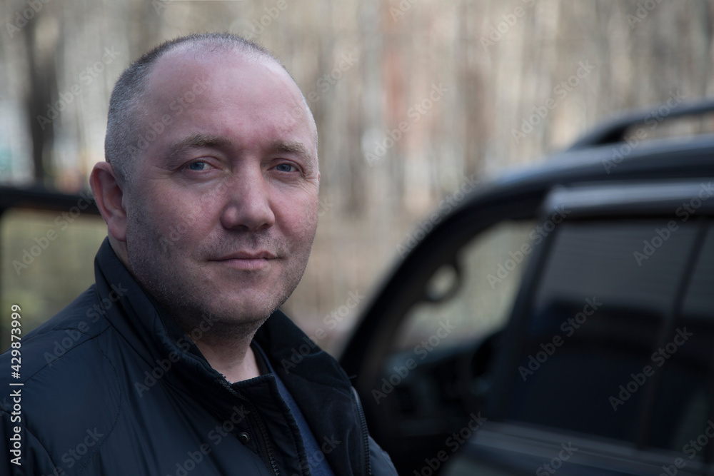 Portrait of a man with a receding hairline. The problem of baldness. Portrait of a man with a receding hairline. The problem of baldness.
