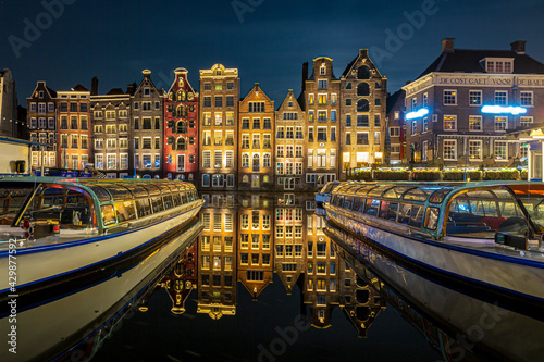 Amsterdam Damrak traditional Dutch architecture at night