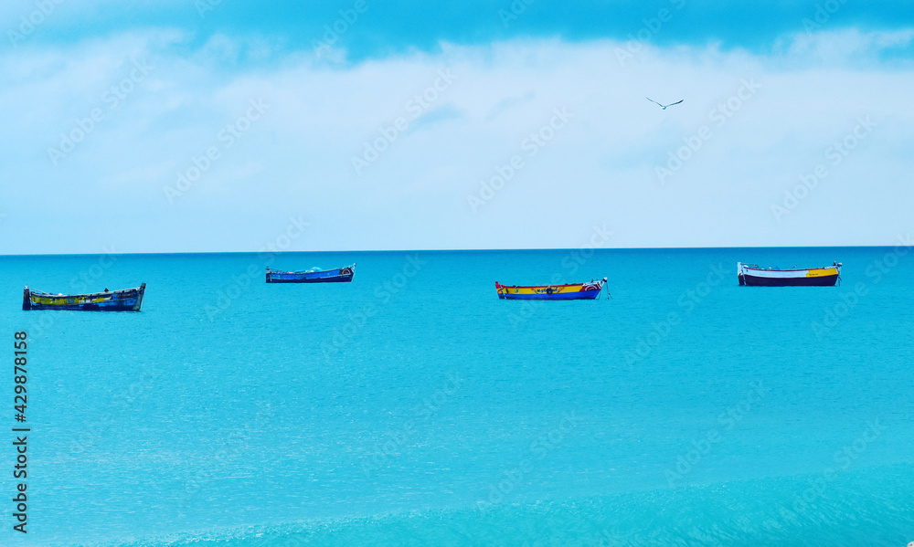 colourful boats on the silent sea