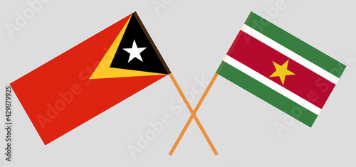 Crossed flags of East Timor and Suriname. Official colors. Correct proportion Free Download Crossed flags of East Timor and Suriname. Official colors. Correct proportion - GFXLoad