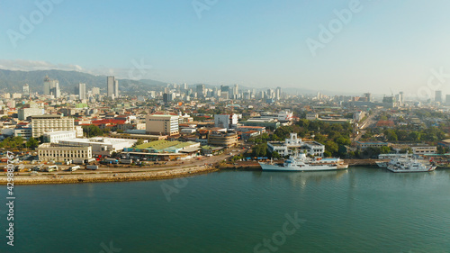 Cebu City, a major city on the island of Cebu, with skyscrapers and residential buildings in the early morning. Philippines.