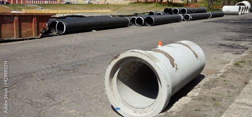Cement Piping on Urban Street for Construction in Daylight