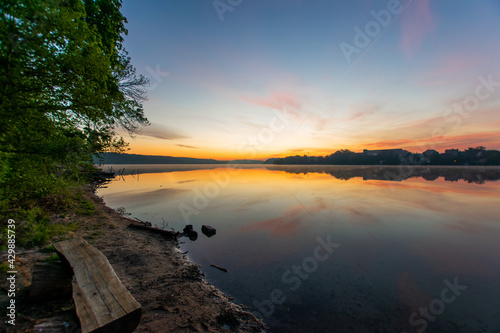 sunrise scenery at a lake (Straussee, Brandenburg, Germany) photo