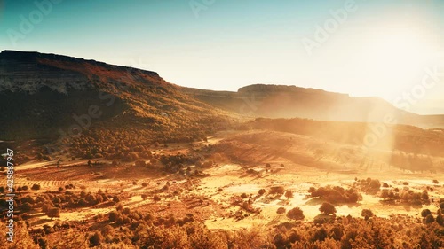 Time lapse. Morning light over mountain and valley with restored grounds of Sad Hill Cemetery, the fictional round graveyard where the final duel of western The Good, The Bad and the Ugly takes place.