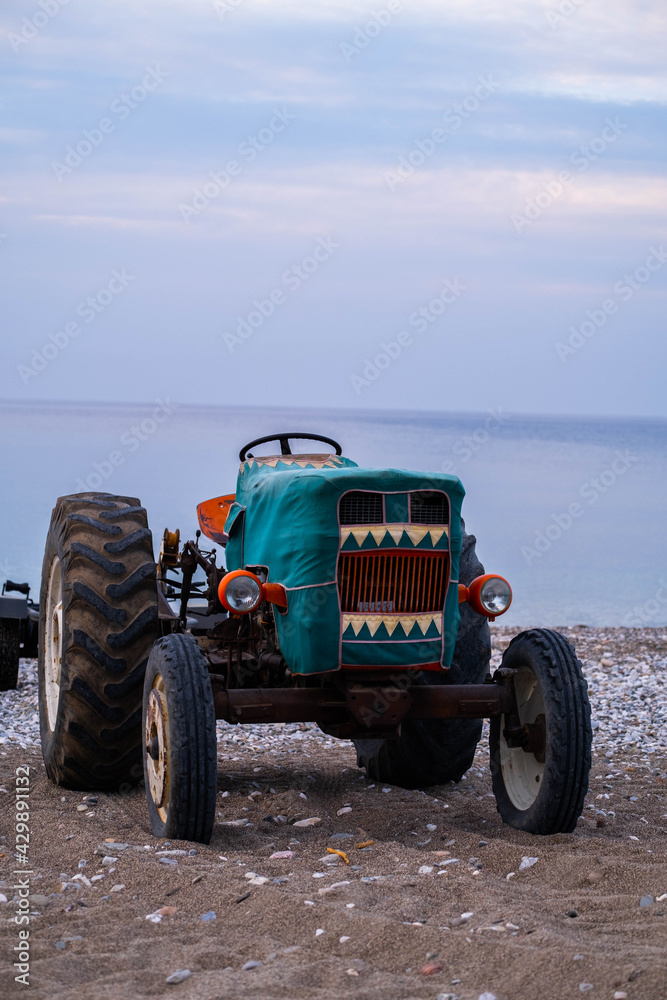 red tractor on the beach red tractor on the beach