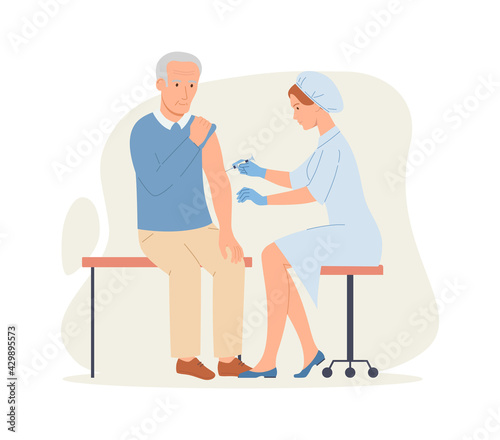 Time to vaccinate - doctor vaccinates an elderly man. Good immunity, vaccination for COVID-19, or influenza.