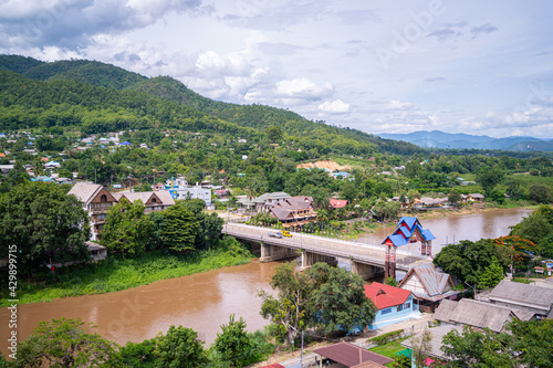 Tha Ton Thailand Jan 3 2020, view of village and Kok river from Wat Tha Ton,The river after the rain. photo