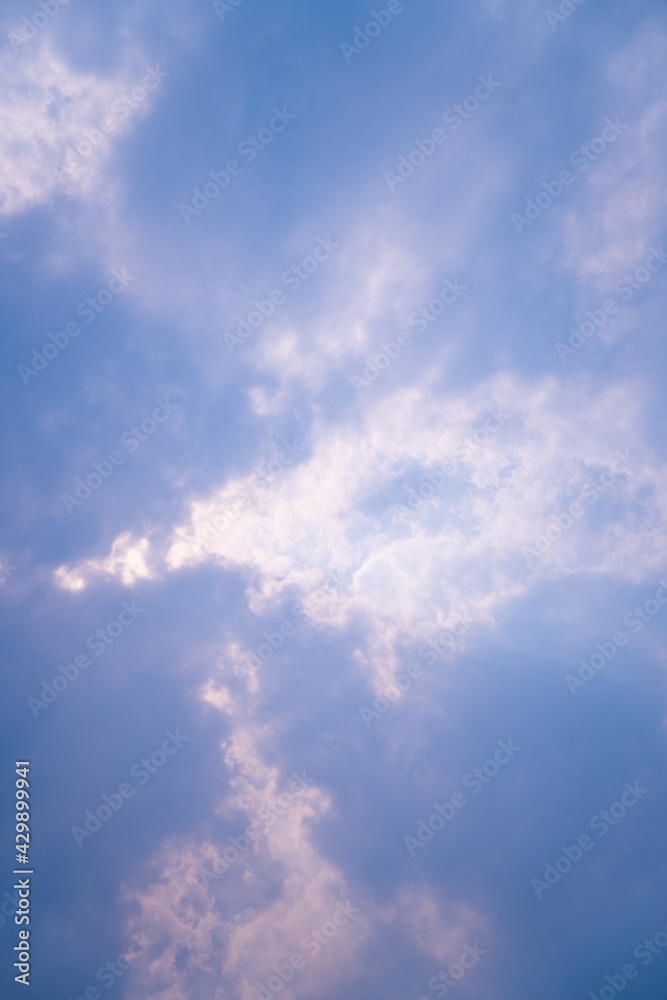 The clouds covered the sun,The sun shines through the clouds,Clouds forming before rain